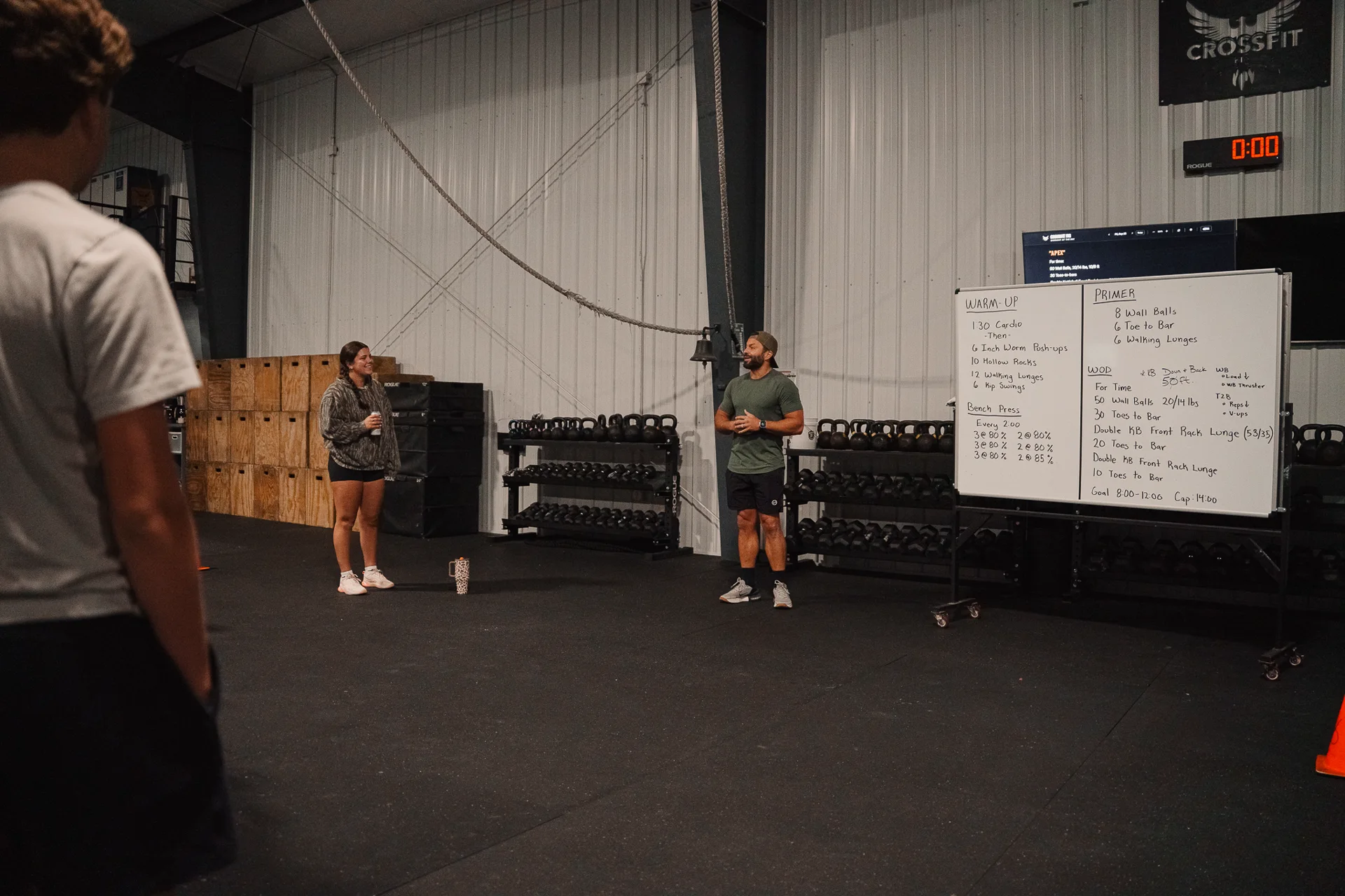 Coach briefing members before a workout at CrossFit Fig in Grain Valley, MO